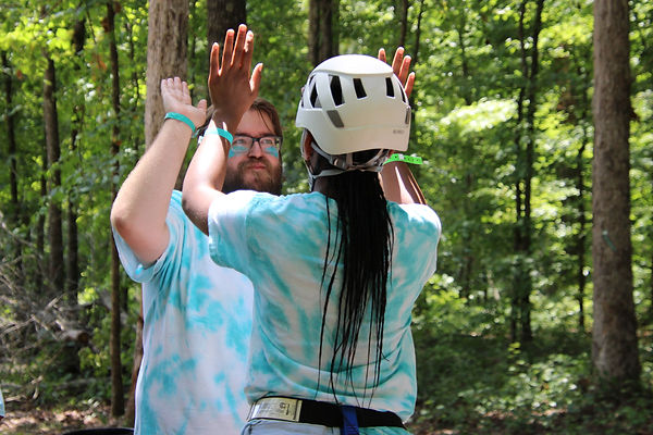 IMG_2385 Michael Counselor High Fives Kimora Wall Climb Aqua EDITED.JPG