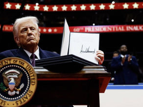 President Trump showing his executive orders 