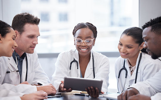 shot-of-a-group-of-doctors-having-a-staff-meeting-2025-04-06-11-38-32-utc.jpg