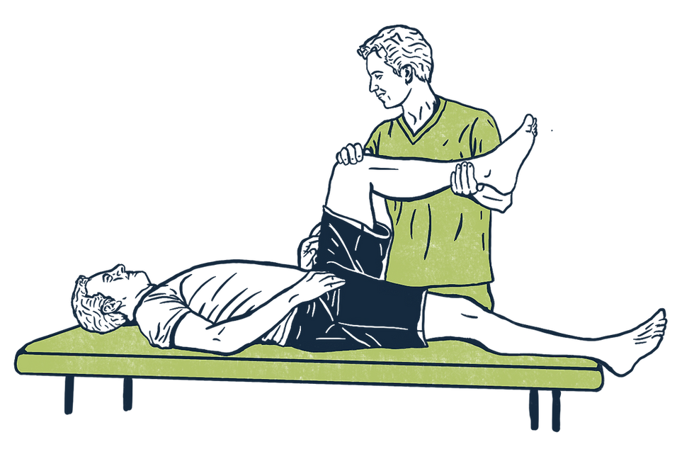 doctor of physical therapy treating a client