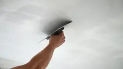 Man-patching-ceiling.jpg