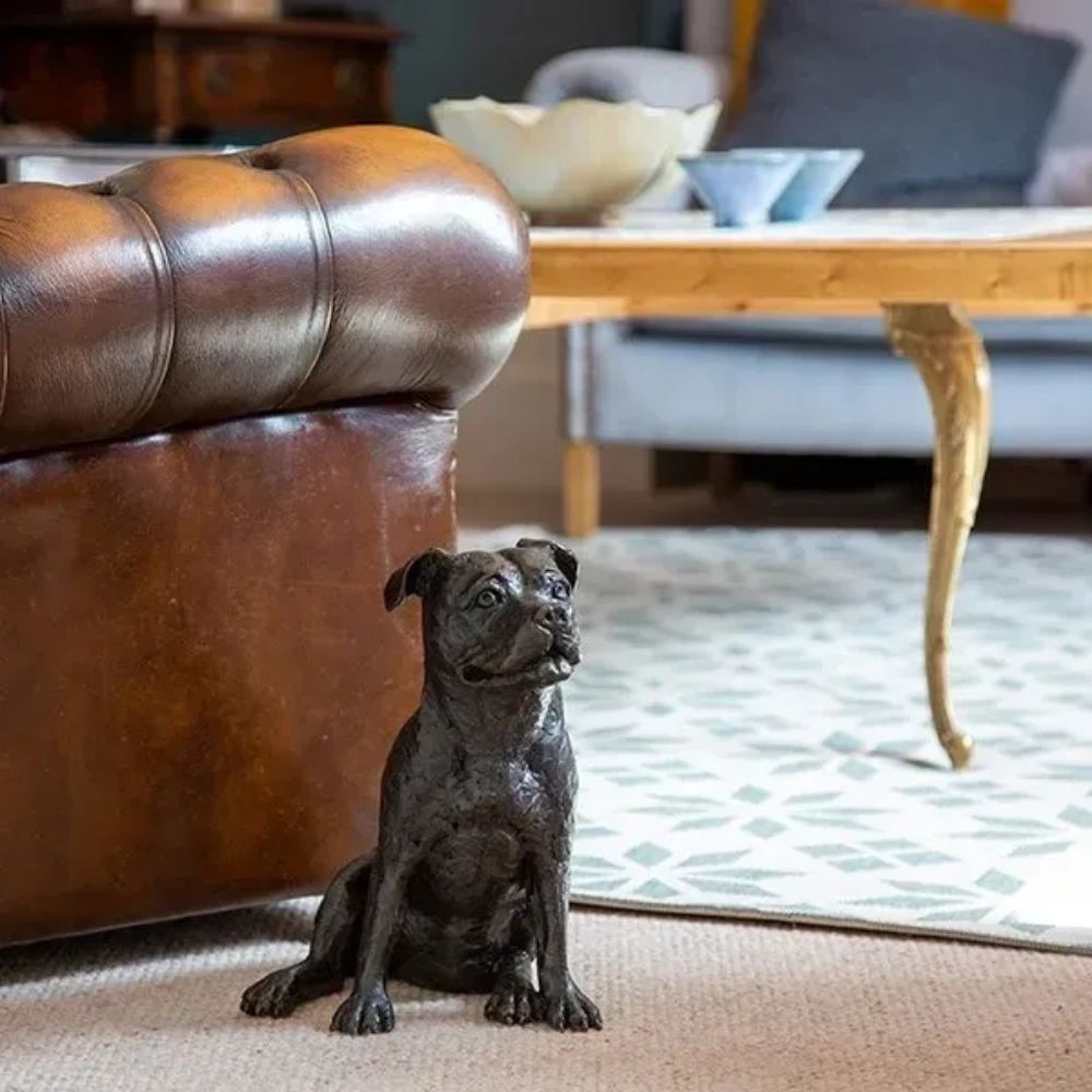 Petributes Staffy Sculptured urn in an antique bronze finish.