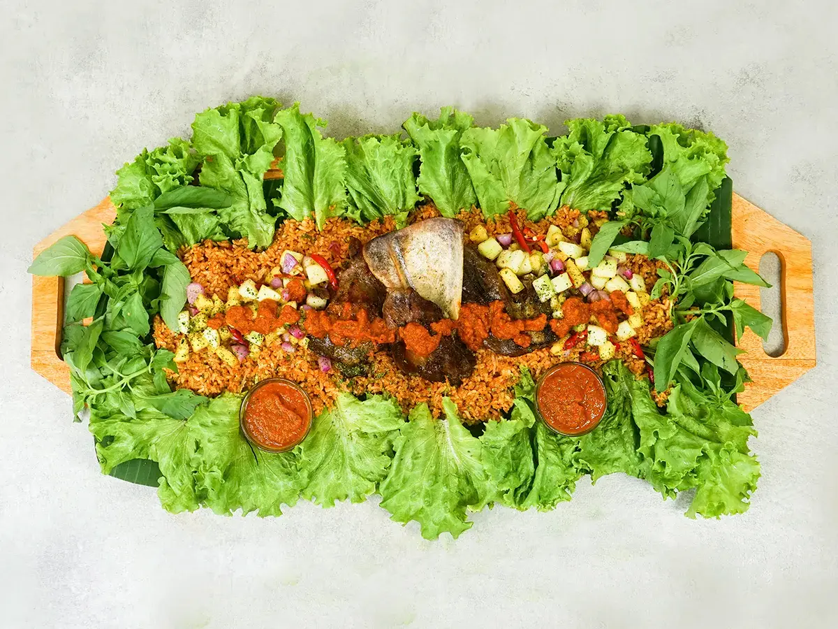 Moroccan Andaliman Lamb with Aromatic Rice dengan nasi rempah, lamb confit, saus andaliman, dan acar timun.