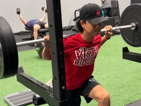 high school athlete lifting weights at Barbell Coalition