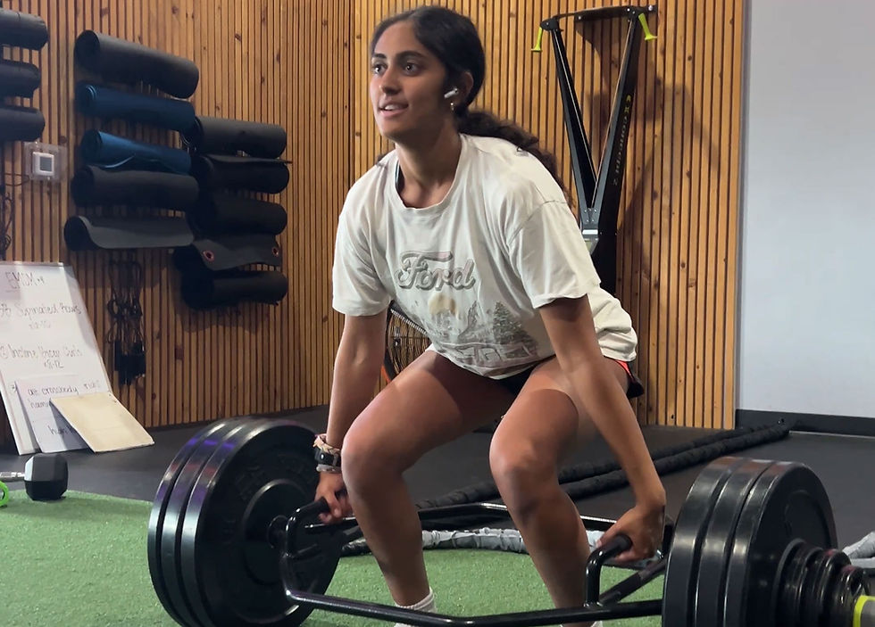 youth athlete performing hex bar deadlift at Barbell Coalition in Cedar Park