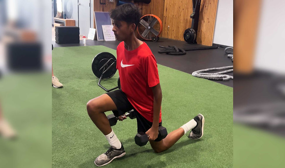 youth athlete performing dumbbell lunge exercise