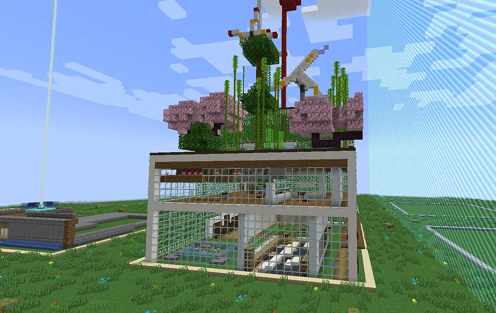 A glass-walled habitat with a rooftop garden and wind turbines, built by students in New Earth
