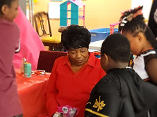 Ms. Brenda with candy.jpg