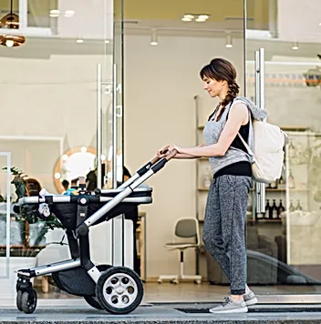Mom with Baby Carriage.webp