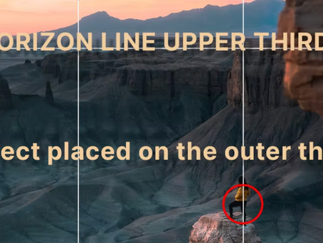 Landscape photograph of a desert canyon at sunset with the horizon aligned along the upper third and a person standing on a rock formation positioned near the right vertical third intersection, demonstrating rule of thirds composition.