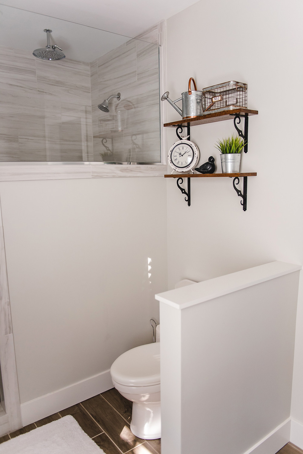 The toilet and shower space.