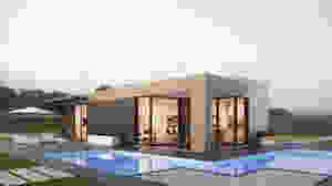 A modern tiny house with sweeping windows.