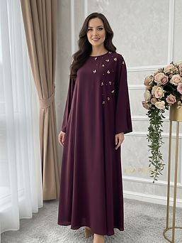 The perfect dress for every special occasion. This Flowy Maroon Abaya-Dress features a fla