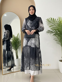 This black ethnic patterned long dress is made from a lightweight, flowy fabric that creat