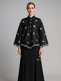 Elegance in simplicity ✨ Draped in fabric with luxurious golden embroidery that radiates t