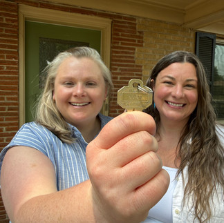 New homeowners with the new home