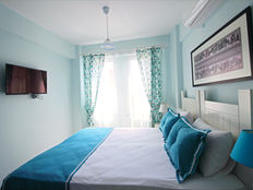 Nilada Standart Oda - Bozcaada butik otel konaklaması için modern ve konforlu oda tasarımı.