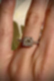 diamond engagement band on a woman's hand