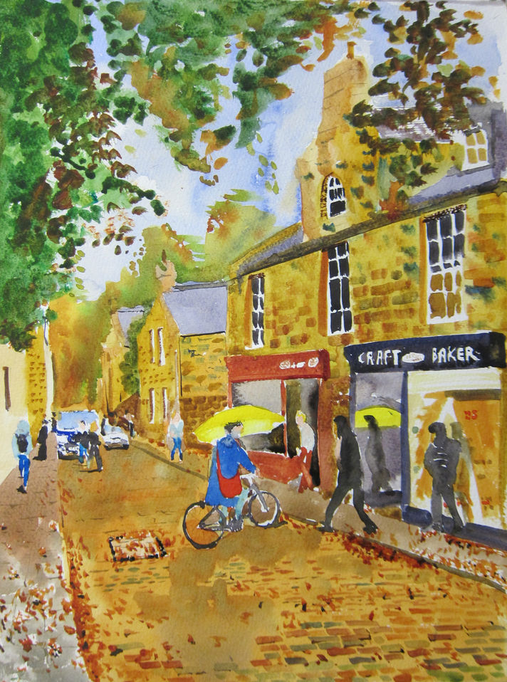 Girl on a bike with a yellow brolly