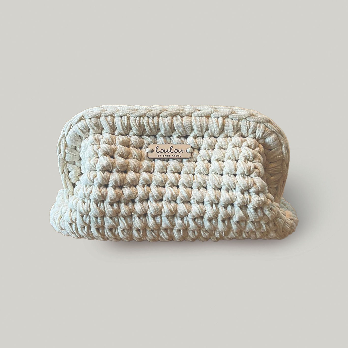 תיק קלאץ׳ מבד טריקו בגוון שמנת