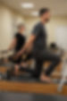 side-view-man-old-woman-pilates-class.jpg