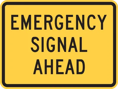 W11-12P Emergency Signal Ahead (plaque)