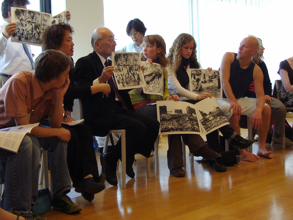 Terumi Tanaka, secretary-general of Nihon Hidankyo, tells the story of surviving the atomic bombing of Nagasaki to young people at a UN event in Vienna in 2007. Source: Wikimedia