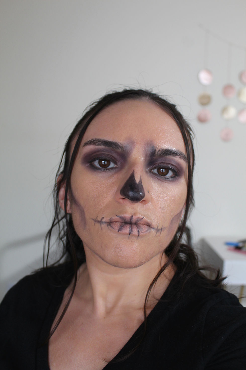Creative Contour By Carla is showing the Spooky Skeleton makeup look.