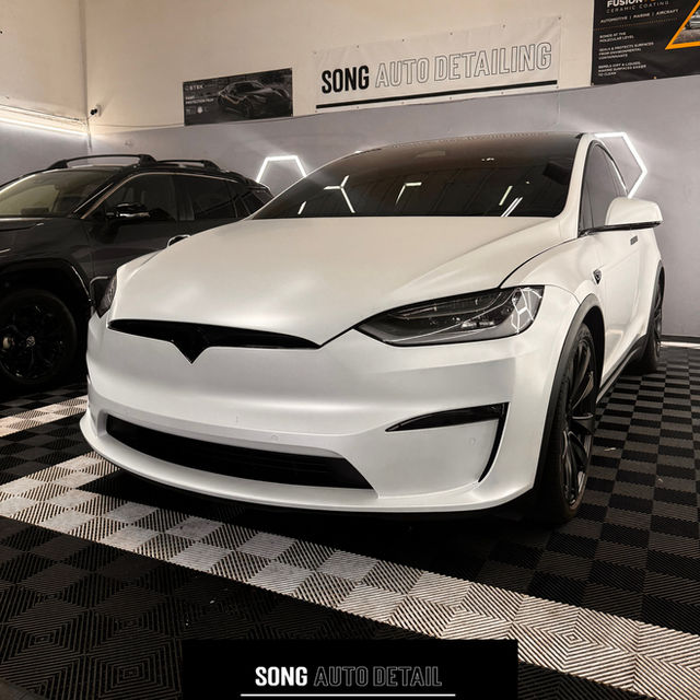 White Tesla at Song Auto Detailing shop, Santa Clara CA
