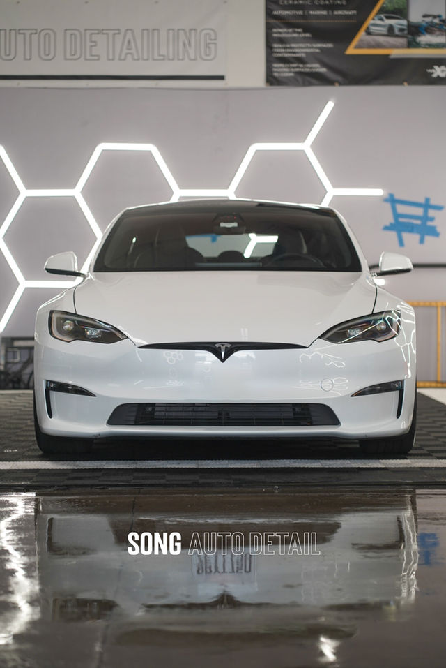 White Tesla in a detailing studio with honeycomb lighting | Song Auto Detail, Santa Clara CA