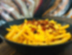 Patatine fritte con cheddar e bacon