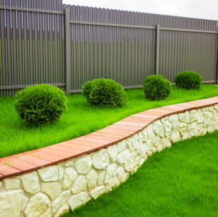 Dania Beach, FL. Shadowbox Dura Fence Aluminum, Masonry, Wall and Landscape Design-Build.