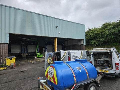 jetwashing this metal cladding at a retail distribution unit