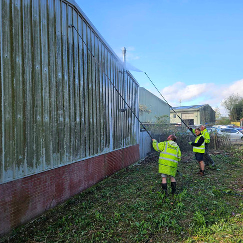 The in progress jet washing to the outside of the building