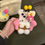 Thumbnail: Bumblebee Hello Kitty Fleece iPhone Case W/ Crocheted Flowers