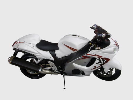 White motorcycle prepared for transport and towing in Montreal