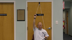 Shoulder pulley flexion stretching exercise