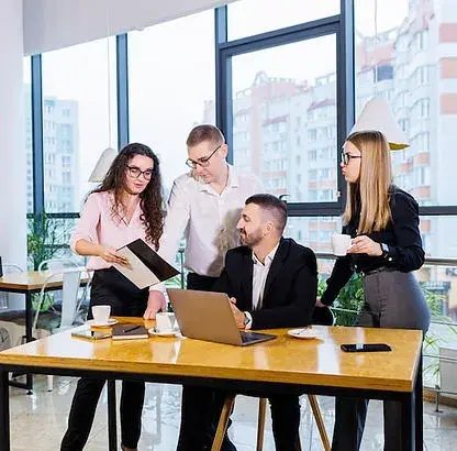 Business team collaborating during an office partnership meeting