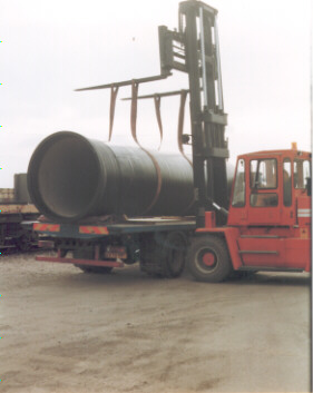 forklift vehicle lifts pipes