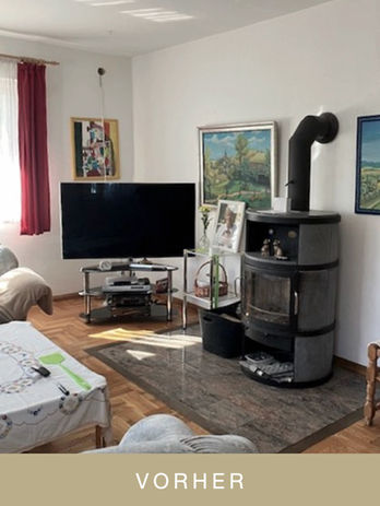 corner of a room with old fashioned metal TV stand next to a wood stove