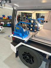 Durable RedDirt Hydraulic Repair Trailer with powder-coated finish and dual batteries