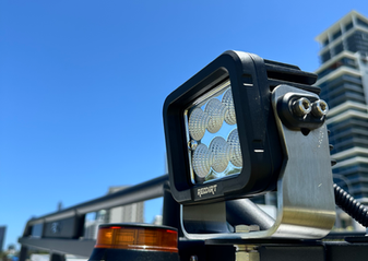 Mine-site service trailer by RedDirt with safety beacons and LED work lights