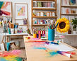 Art studio with multiple mediums and bright colors_edited.jpg