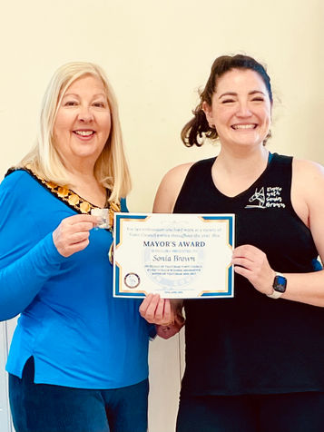 Receiving the Mayor’s Award