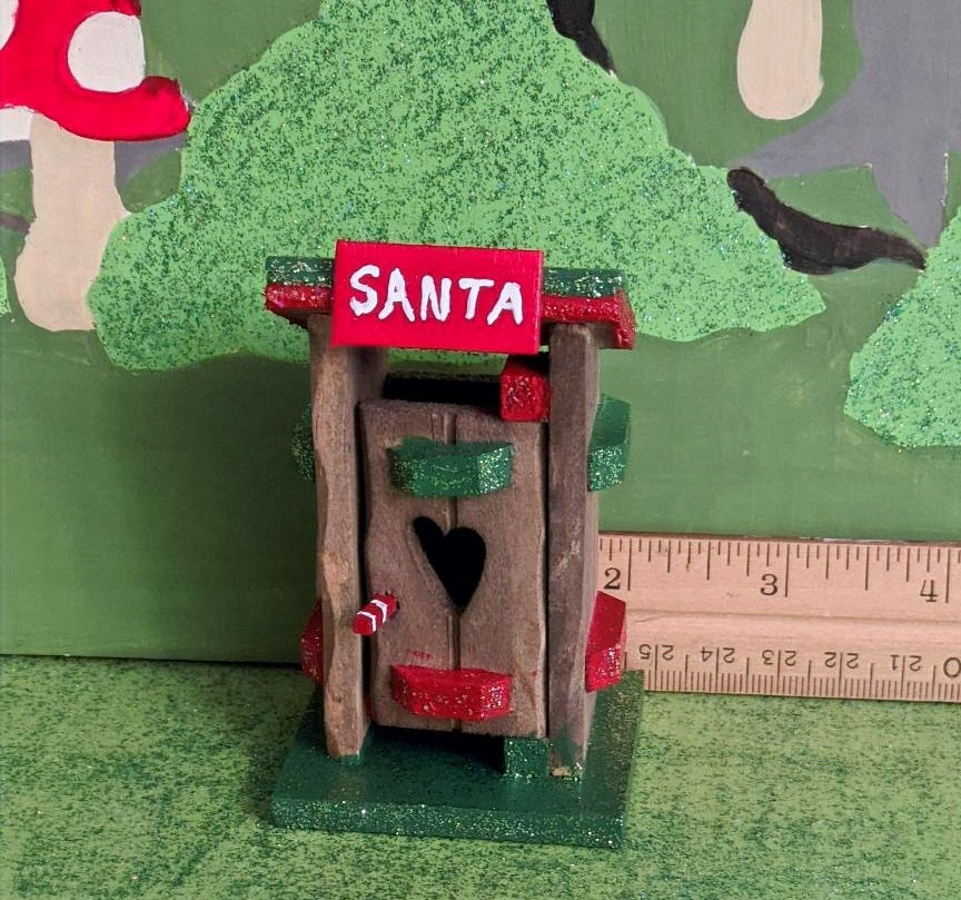 Thumbnail: Miniature Christmas Santa Wooden Outhouse Hand Painted Christmas Village Garden