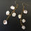 Thumbnail: long elegant earrings with freeform pearls