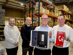 Vox Ignis employee holding equipment