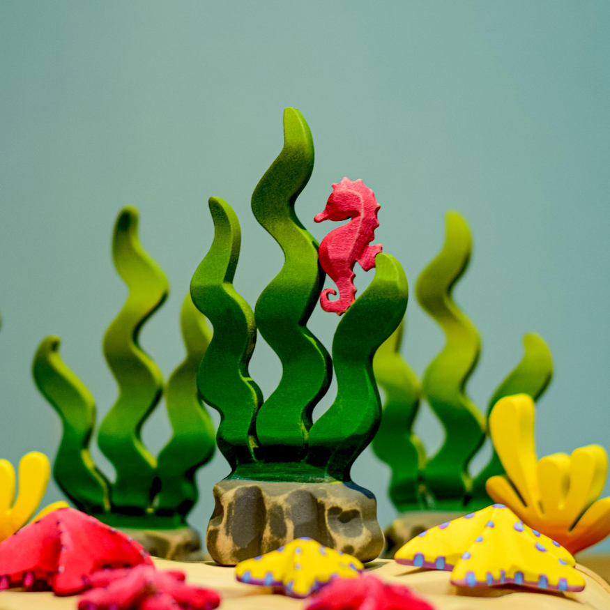 Thumbnail: Bumbu Toys Wooden Yellow Starfish Set. Handcrafted Waldorf inspired small world toys. Imaginative play and storytelling
