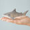 Thumbnail: Bumbu Toys Wooden Shark being held in an adult’s hand to show scale and detail.