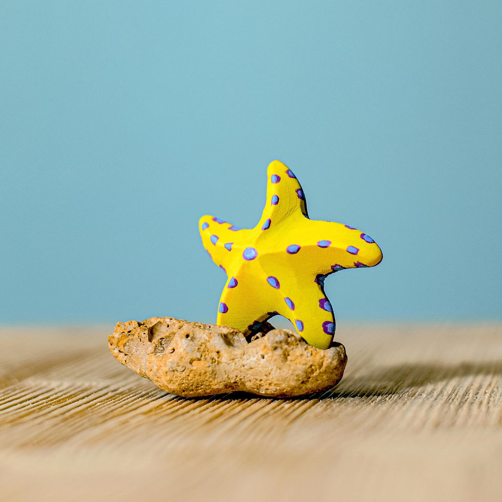 Thumbnail: Bumbu Toys Wooden Yellow Starfish Set. Handcrafted Waldorf inspired small world toys. Imaginative play and storytelling